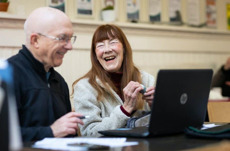 Older adults using a laptop